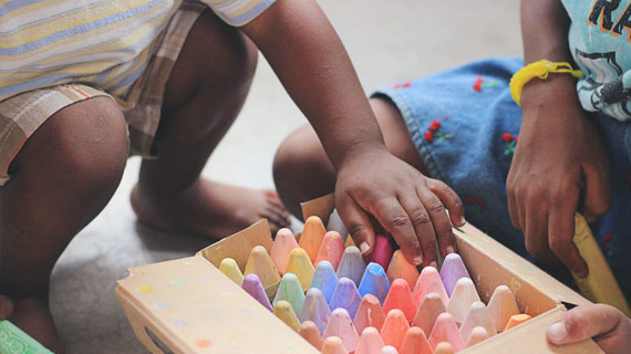 Children playing with chalk