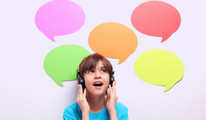 Student using headphones for a better listening experience in the classroom